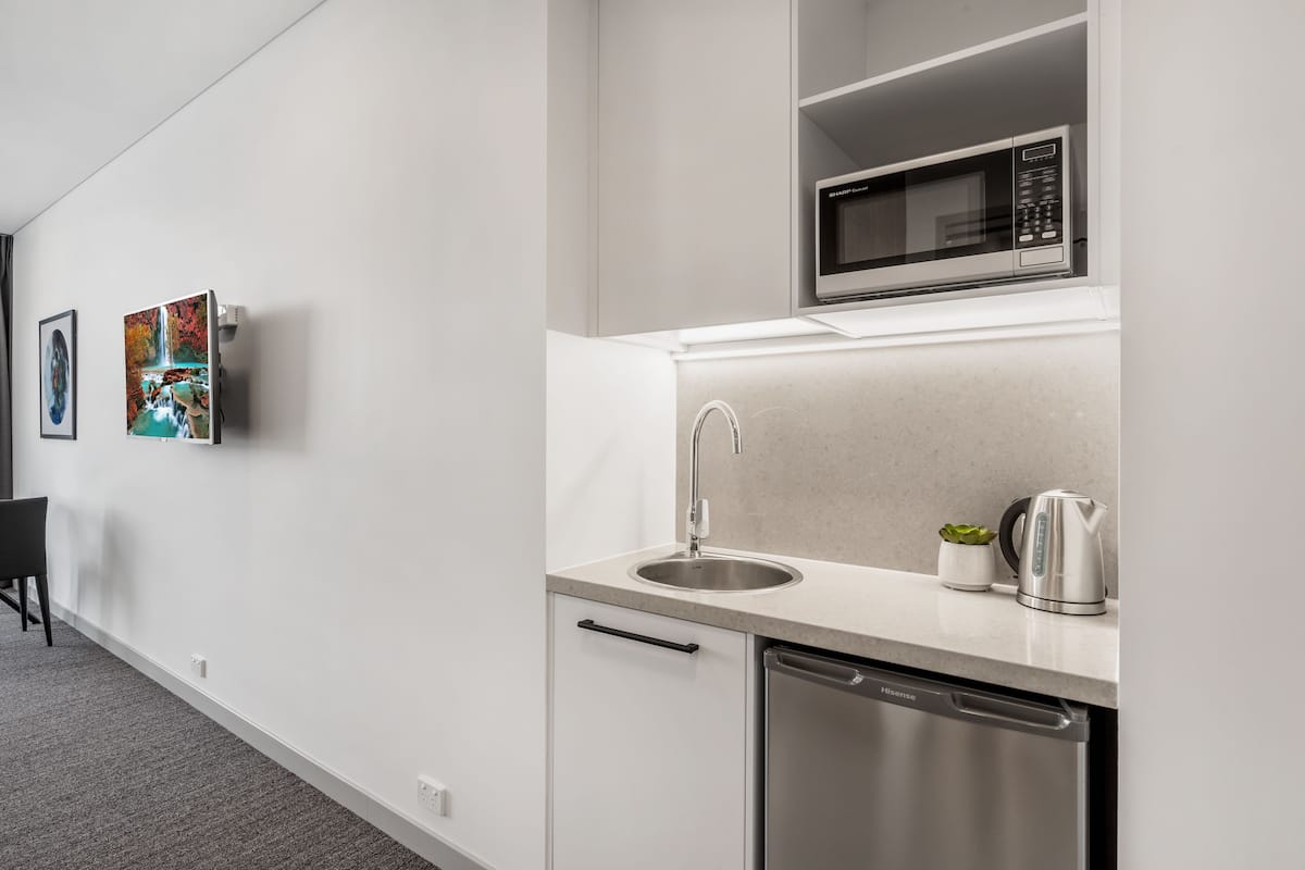 studio queen suite | private kitchenette | mini-fridge, microwave, coffee/tea maker, electric kettle