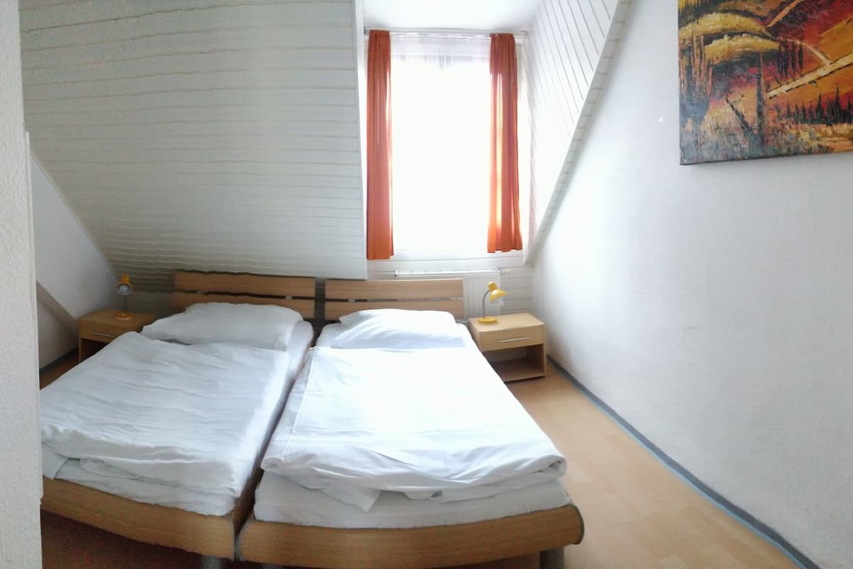 Basic Double Room | In-room safe, desk, WiFi (surcharge), bed sheets