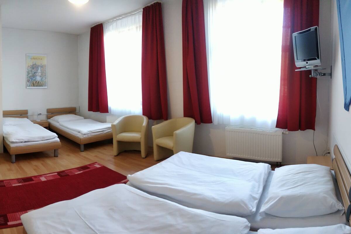 Quadruple Room | In-room safe, desk, WiFi (surcharge), bed sheets
