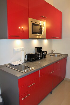 City Apartment, 1 Bedroom | Living room | Flat-screen TV