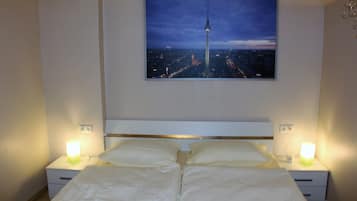 City Apartment, 1 Queen Bed with Sofa bed, Patio | Living area | Flat-screen TV