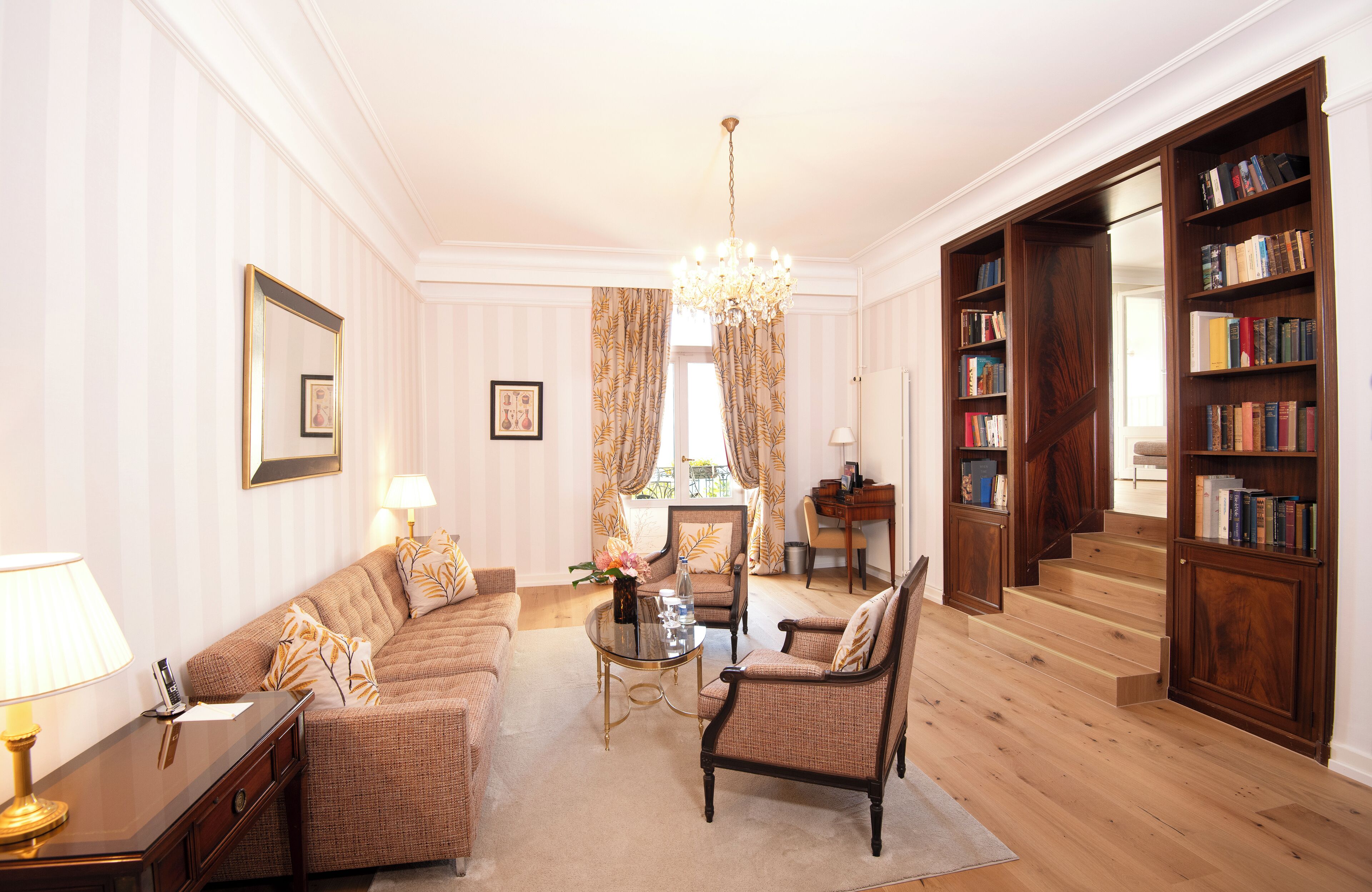 traditional suite, lake view | living area | 110-cm flat-screen tv with cable channels, tv