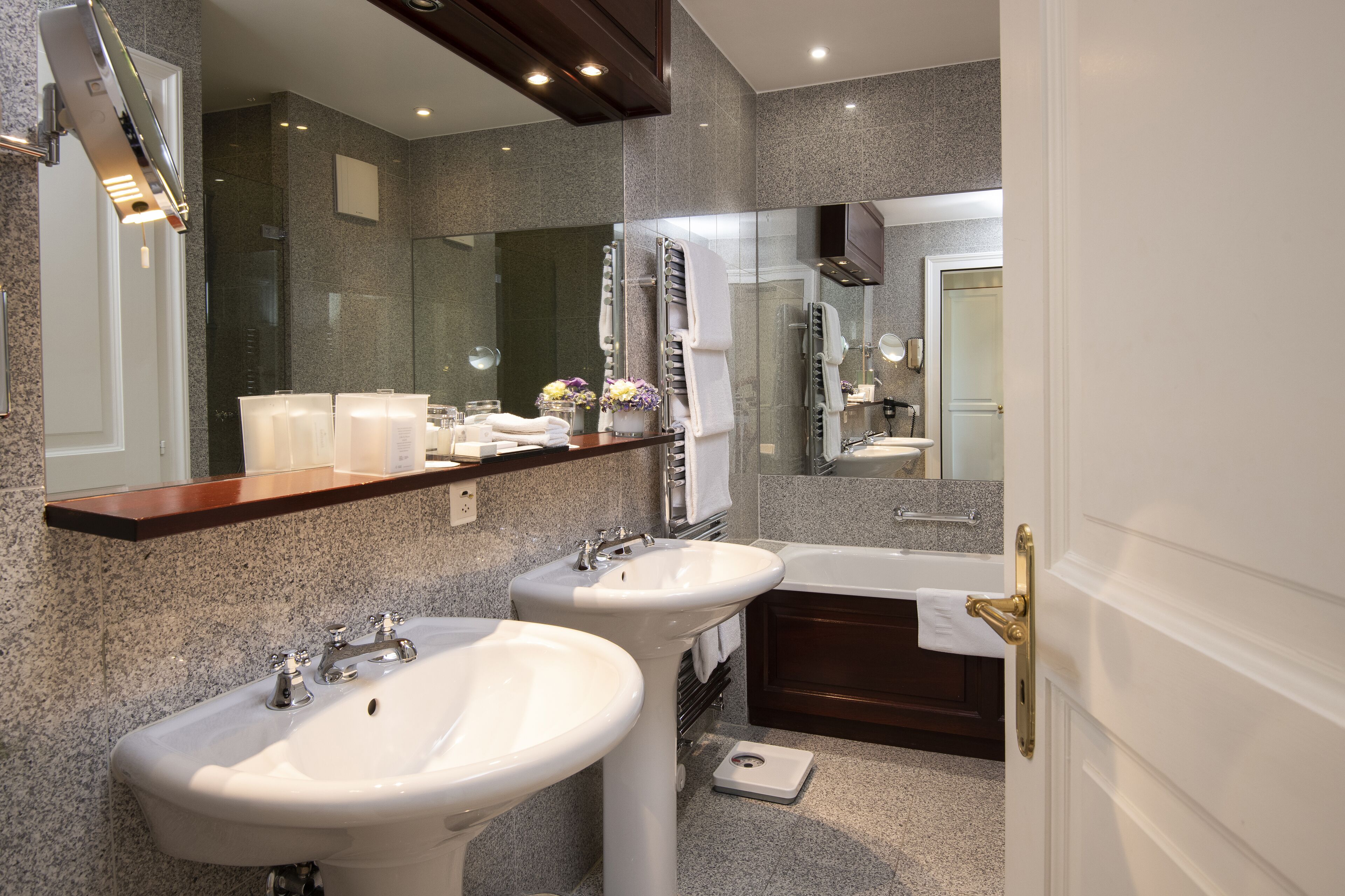 junior suite, lake view | bathroom | separate bathtub and shower, free toiletries, hair dryer, bathrobes