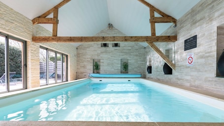 Indoor pool, open 9:30 AM to 8:00 PM, pool umbrellas, sun loungers. Chambres d'Hôtes La Ferme de L'Oudon & Spa