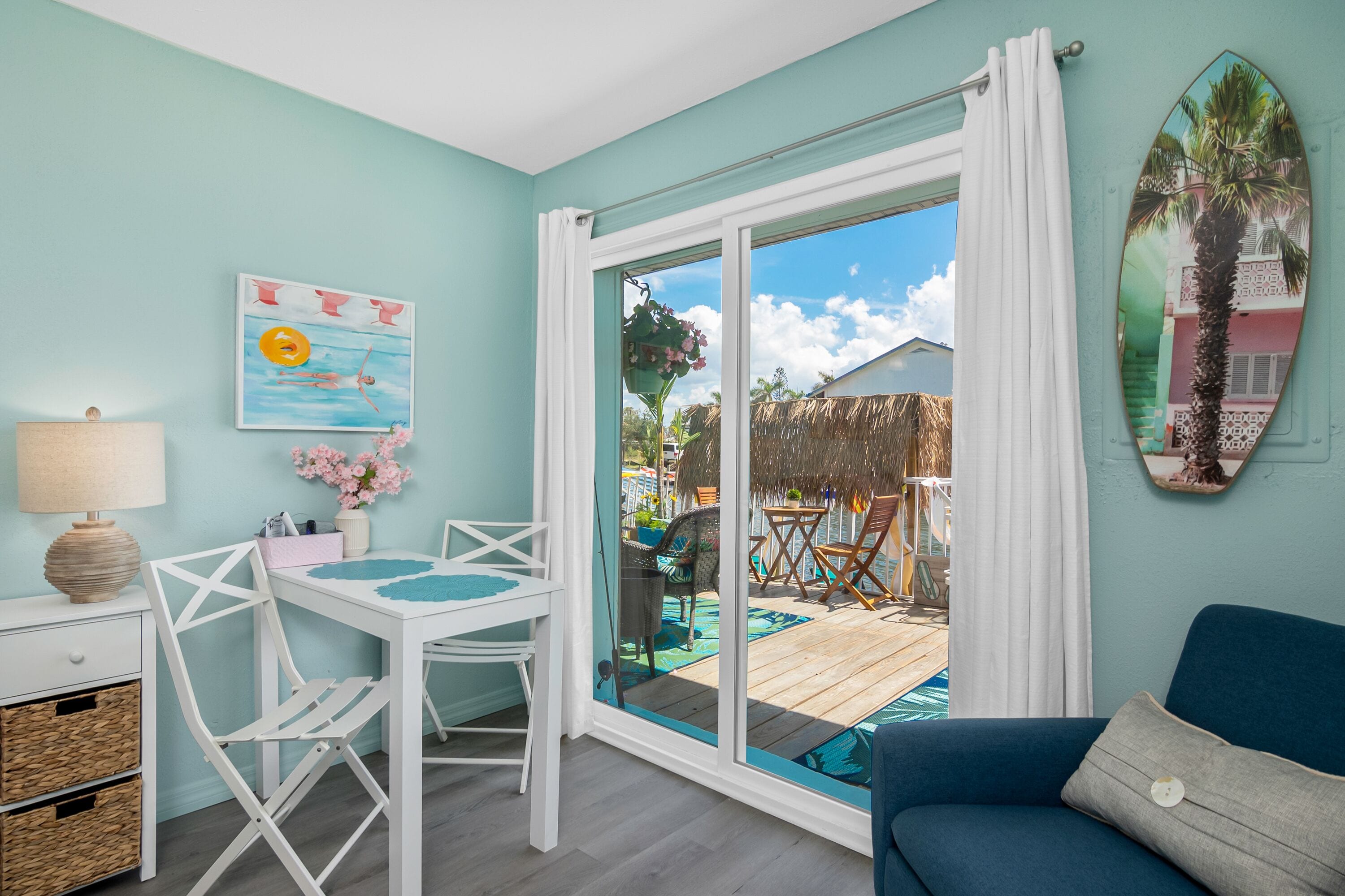 deluxe king studio waterfront | living area | 50-inch smart tv with digital channels, tv