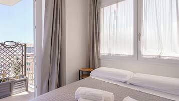 Premium bedding, down comforters, memory foam beds, desk