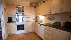 Apartemen, 2 kamar tidur | Dapur pribadi | Mesin pembuat kopi/teh, lemari es, dan microwave