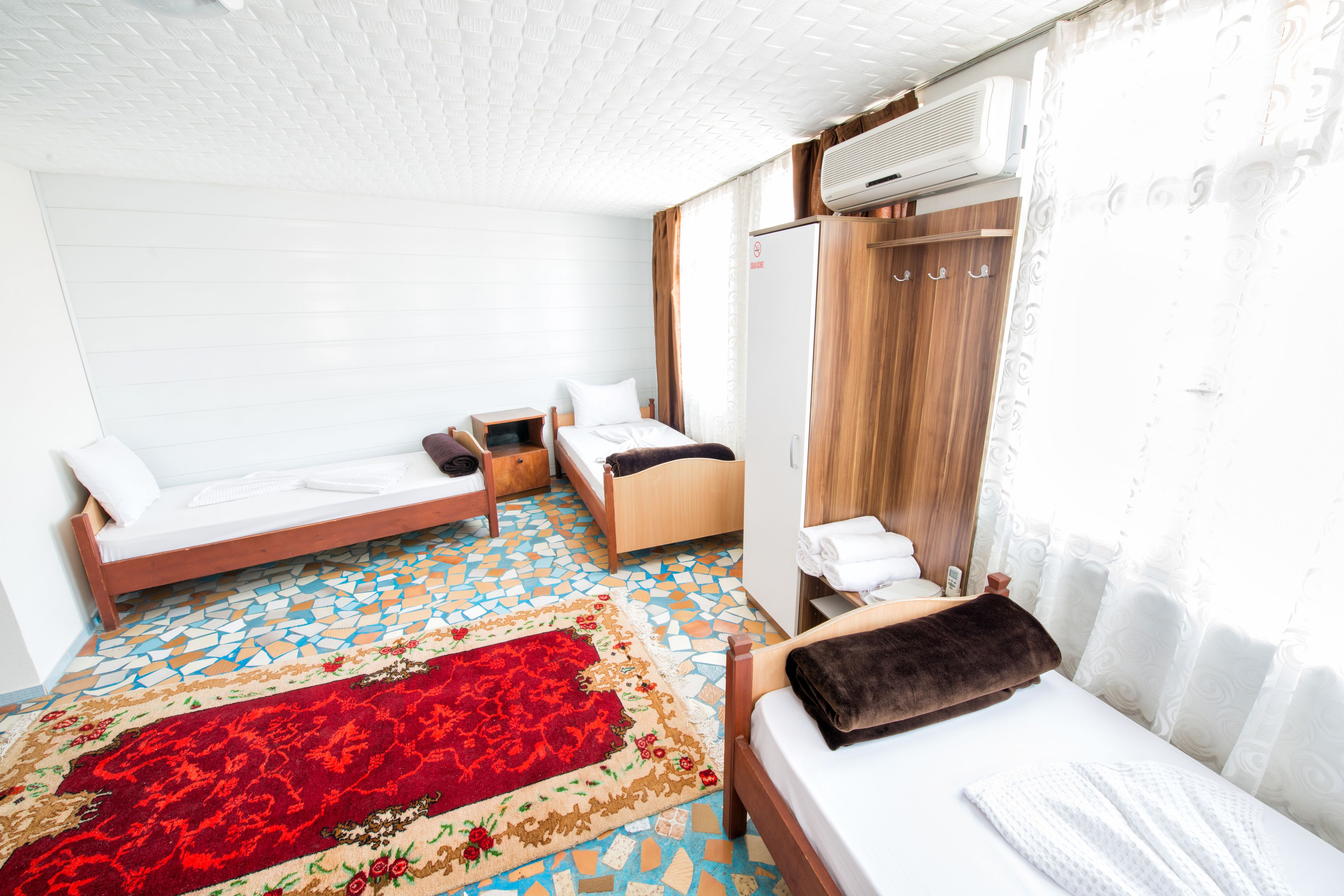 family room, multiple beds | in-room safe, desk, soundproofing, free wifi