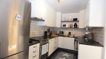 Townhouse, 3 soverom | Eget kjøkken | Kjøleskap, mikrobølgeovn, ovn og kokeplater
