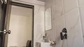 Double or Twin Room | Bathroom | Shower, rainfall showerhead, free toiletries, towels
