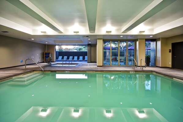 Indoor pool, open 6:00 AM to 11:00 PM, pool loungers