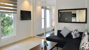 Double or Twin Room | Living area | TV