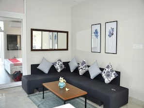 Double or Twin Room | Living area | TV