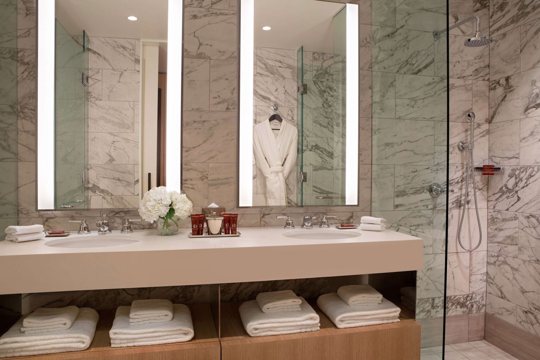Bathroom | Rainfall showerhead, designer toiletries, hair dryer, bathrobes