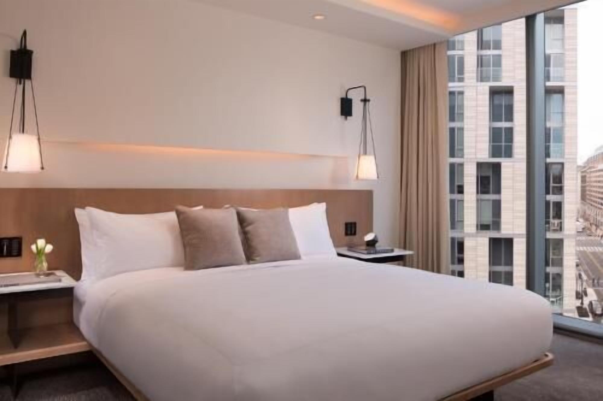 Frette Italian sheets, premium bedding, pillow-top beds, minibar
