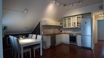 Apartment, 2 Bedrooms | Private kitchen | Fridge, microwave, oven, coffee/tea maker