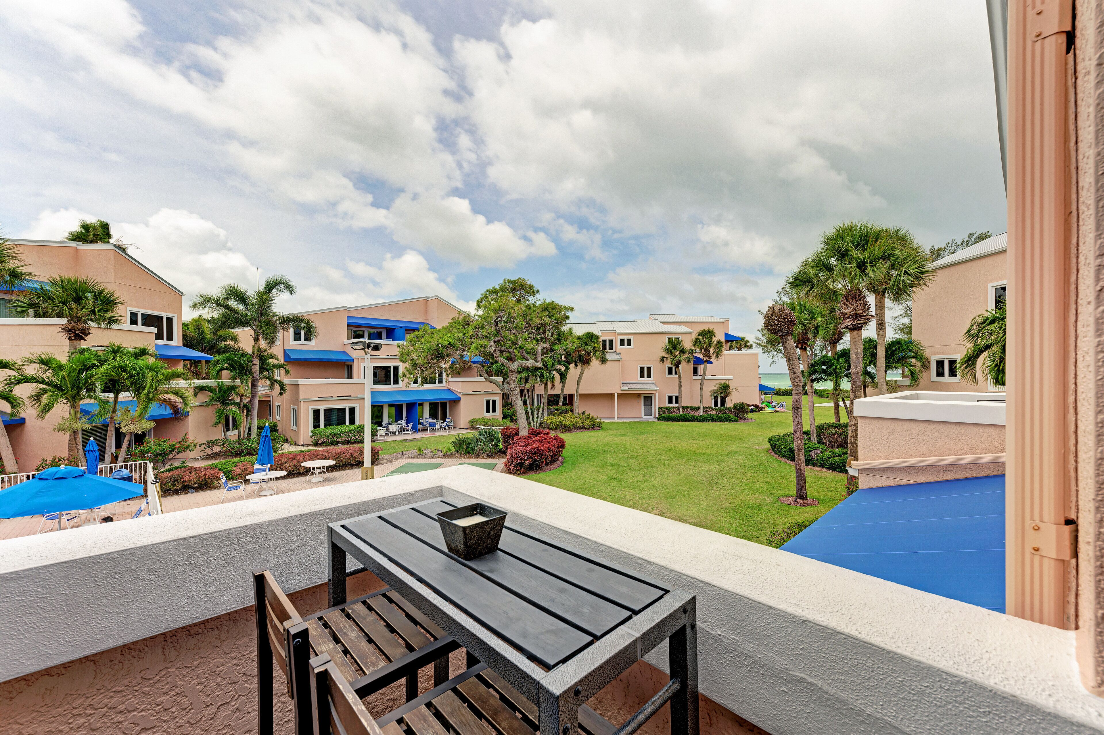 Unit #208 Sand Cay Beach Resort Pool and Garden View