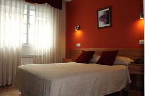 Luxe beddengoed, een bureau, gratis wifi