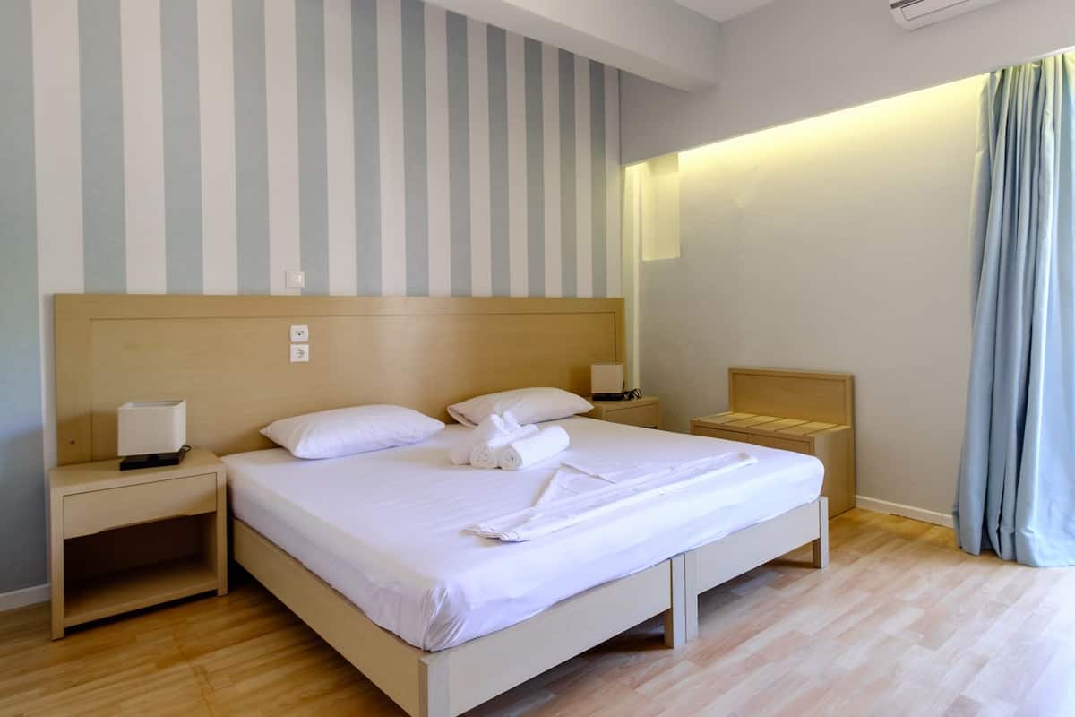 Classic Double Room, Multiple Beds, Non Smoking | Minibar, in-room safe, desk, blackout curtains