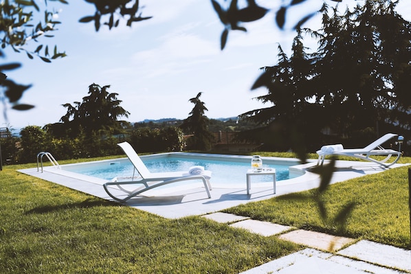 Outdoor pool, pool loungers