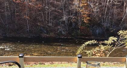 Mountains surround Doe River 400 ft Frontage, wildlife out the back door.