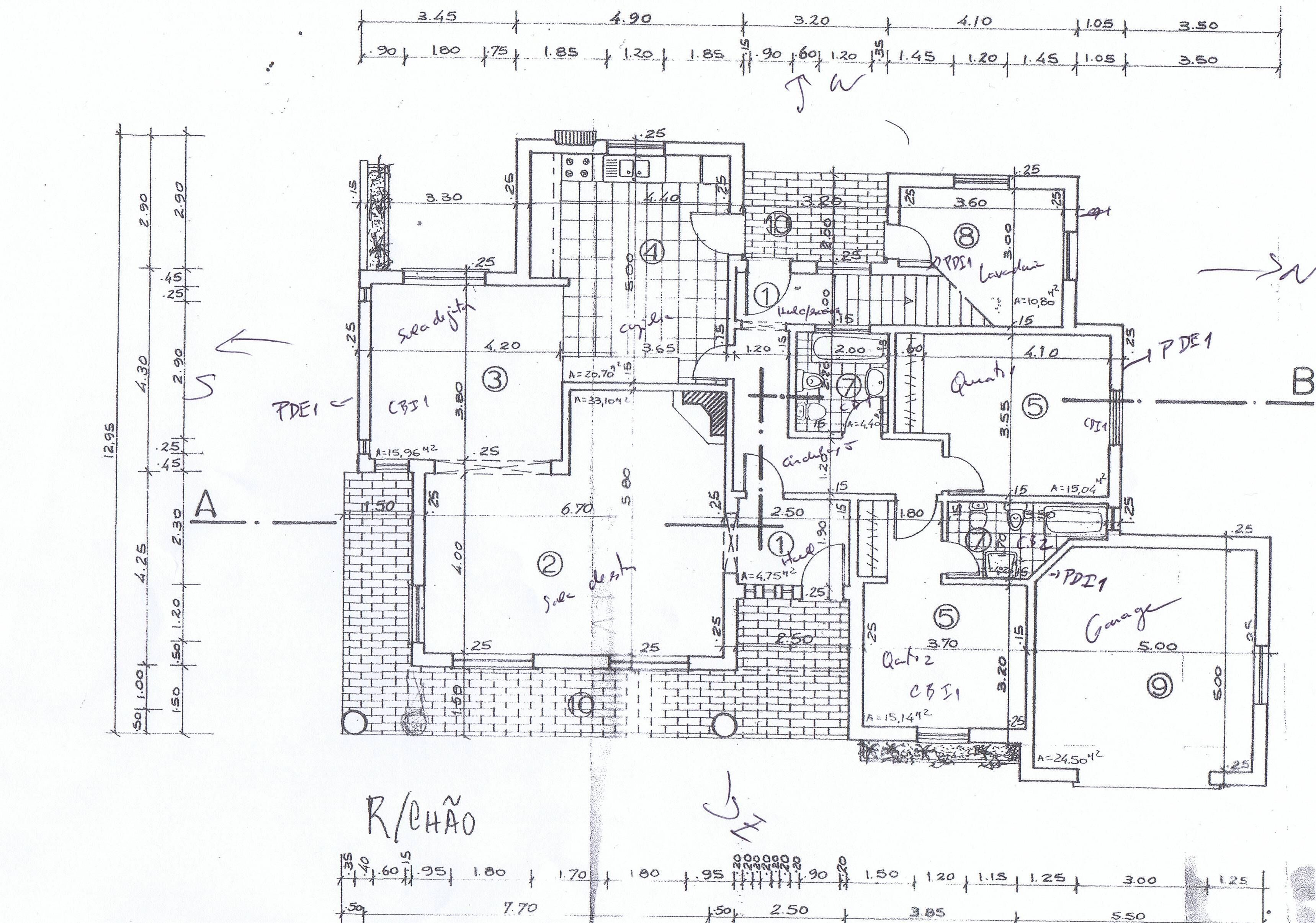 A detailed architectural floor plan of a building with multiple rooms, including labeled areas and dimensions.