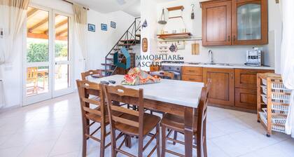 Villa with condominium pool within walking distance of the sea, sleeps 8.