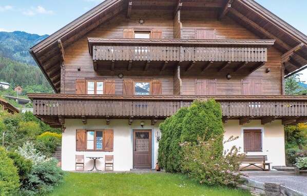 Enjoy a scenic view of the surrounding mountains from the upper floor balcony.
