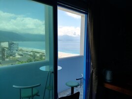 Comfort Quadruple Room, 2 Double Beds, Partial Sea View | Desk, blackout drapes, free WiFi, bed sheets