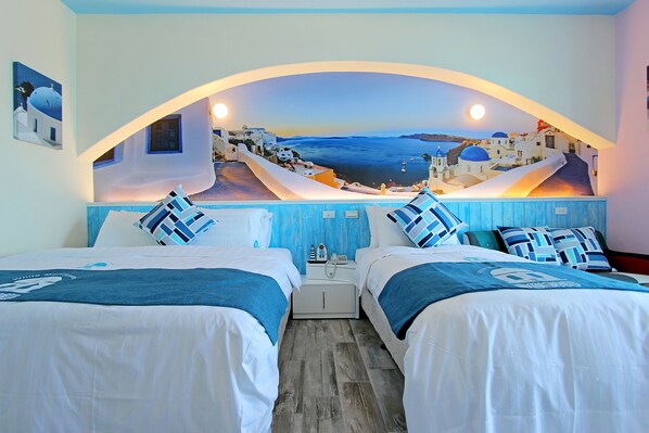 Kamar Triple Standar, 1 kamar tidur, pemandangan laut | Meja kerja, tirai kedap cahaya, Wi-Fi gratis, dan seprai linen