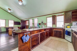 Fridge, microwave, stovetop, coffee/tea maker