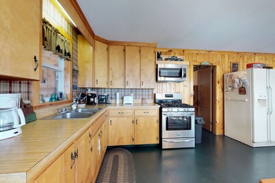 Lakefront Cabin with Lake Views, Cable, Beach Access & Private Dock