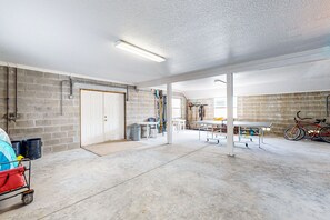 Relax in a spacious area with a table and chairs, perfect for casual gatherings.