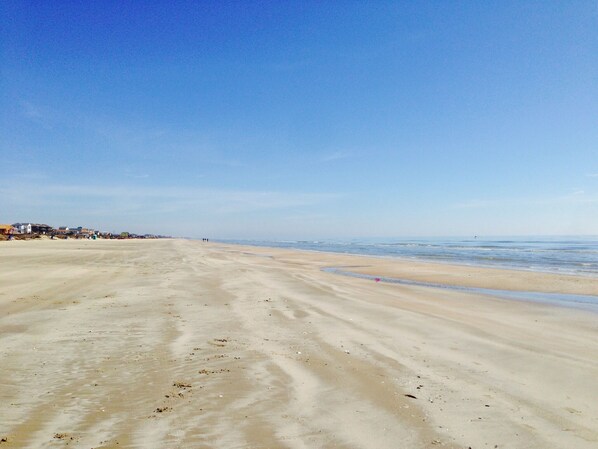 On the beach, sun-loungers, beach towels
