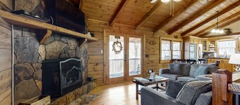 Secluded & upgraded cottage w/ game room, wraparound deck, & private hot tub