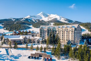 Exterior - Mountain-view condo with heated hot tub, pool, sauna & easy access to slopes (Big Sky)