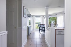 Upon entering, you will notice the renovated kitchen in this updated Spinnaker.