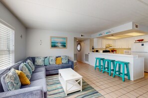 TV, DVD player - Modern dog-friendly condo with a shared pool - moments from the beach (South Padre Island)