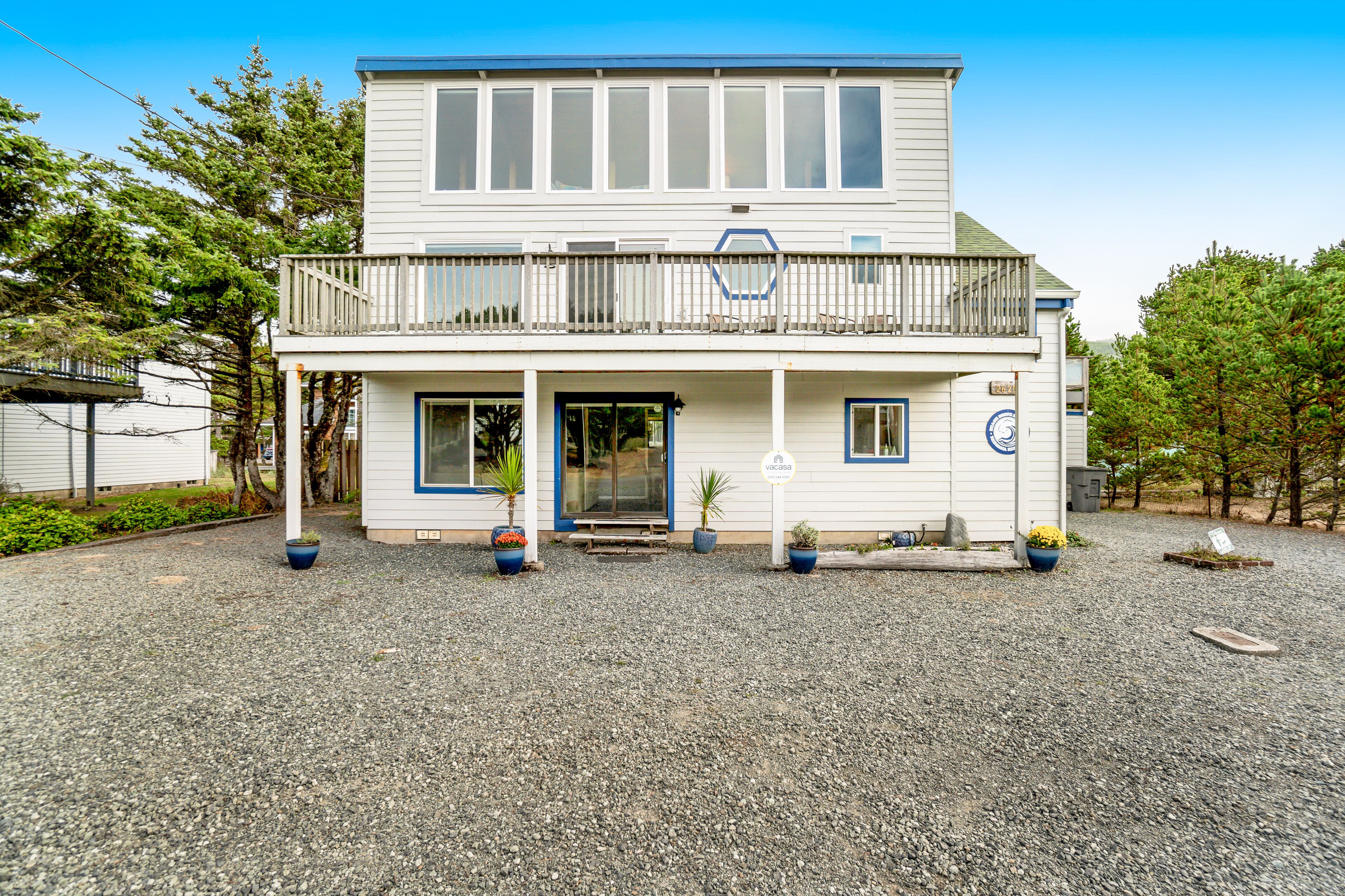 Dog-friendly home across street from beach with rooftop deck & views