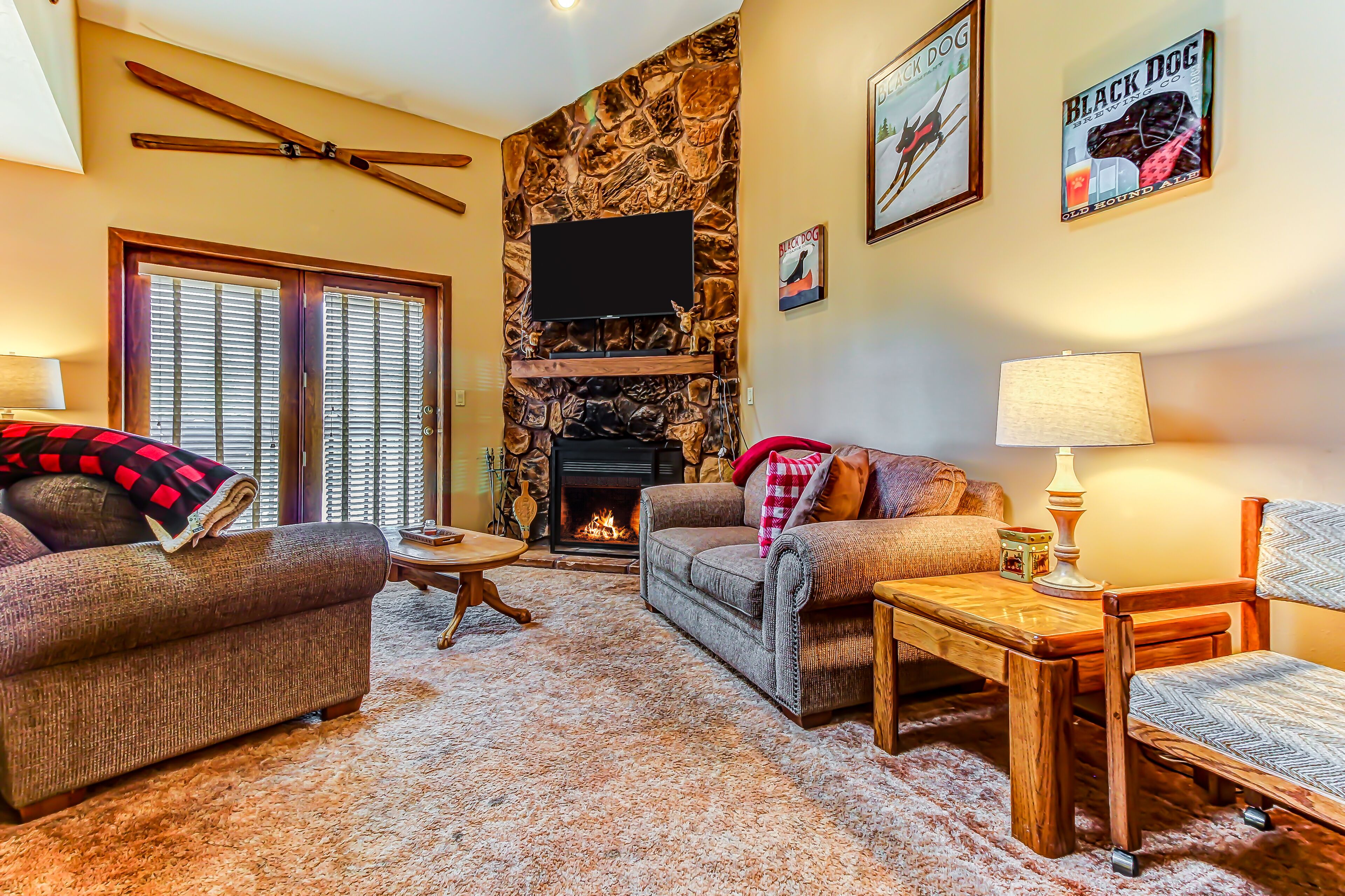 Comfy condo by slopes with balcony, mountain/village views, and shared hot tub