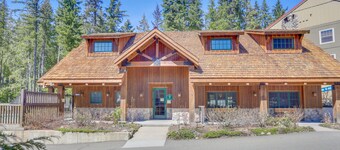 Riverfront mountain townhouse with pool & hot tub, patio, & easy ski access
