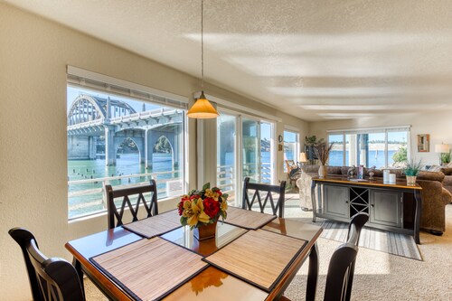 Incredible Riverfront Oasis with Wraparound Deck & Cozy Interior