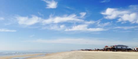 On the beach, sun loungers, beach towels