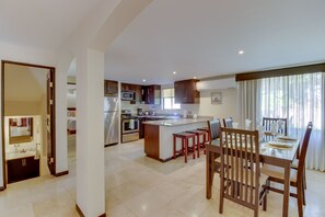 Dining - Four condos together with pool access - near town (Playa Ocotal)