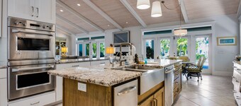 Waterfront home with heated pool + spa, patio, grill, & free WiFi - dog-friendly