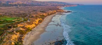 Canal-front huis w / prive-terras, dock & kajaks - dicht bij het strand en de pier!