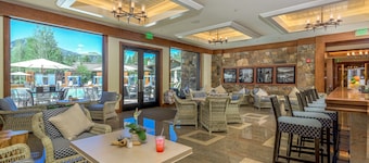 Golf course condo with ski shuttle, shared pools, & hot tub