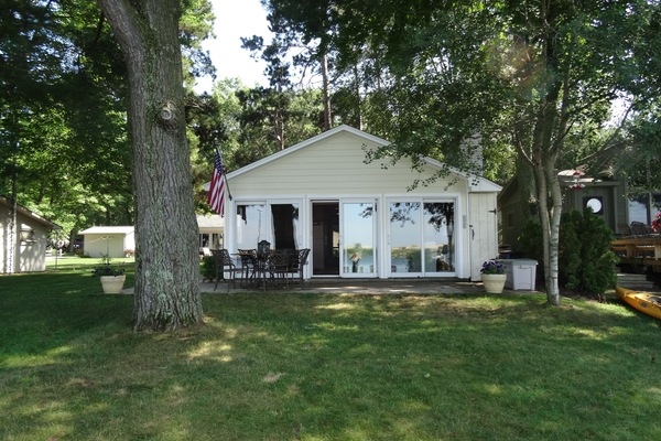 View of cottage from lake edge