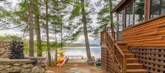 Lakefront cabin on Brandy Pond with dock, deck, firepit, kayaks & paddleboard
