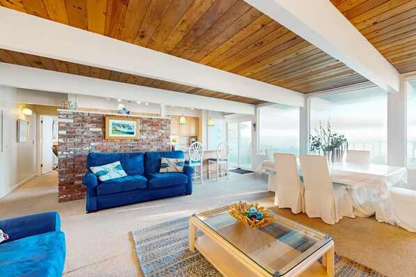 TV, fireplace, books - Bay-front rental with views - across street from beach (Oak Harbor)